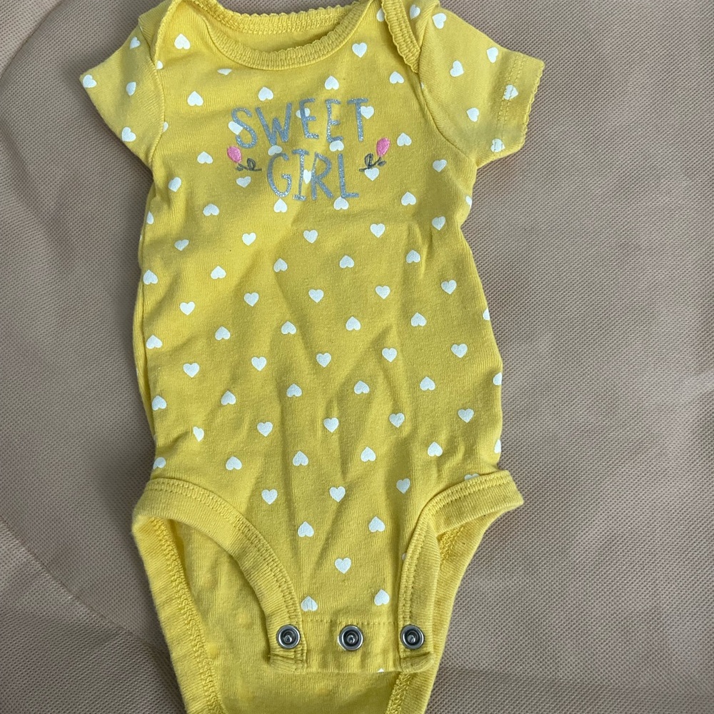 yellow with hearts onesie
